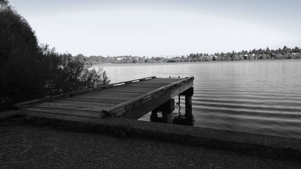 Wooden Dock At A Lake Black And White Photo