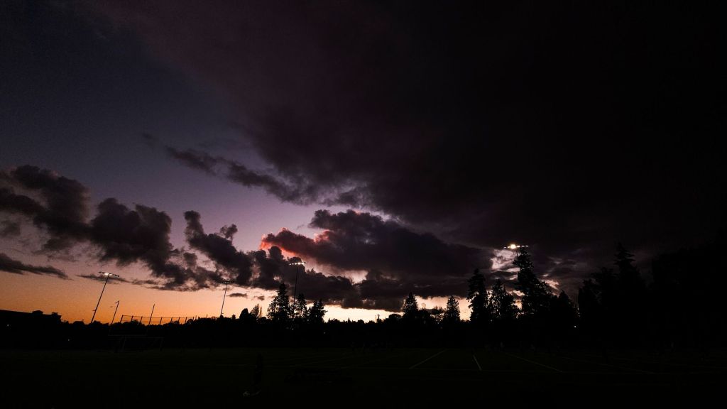 Dark Dramatic Skies With A Purple And Orange Sunset
